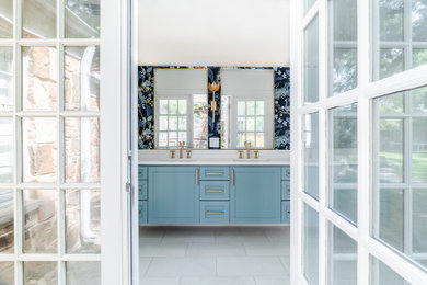 Inspiration for a transitional double-sink and wallpaper bathroom remodel in Dallas with shaker cabinets, blue cabinets and quartz countertops