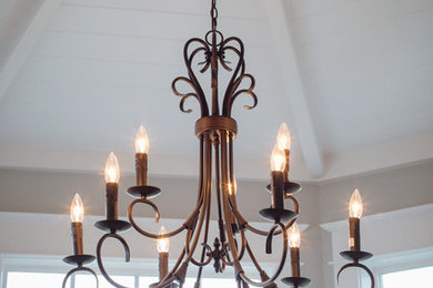 Example of a classic dining room design in Portland with white walls