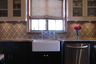 Inspiration for a mid-sized timeless single-wall eat-in kitchen remodel in Denver with a farmhouse sink, glass-front cabinets, dark wood cabinets, granite countertops, gray backsplash, ceramic backsplash, stainless steel appliances and no island