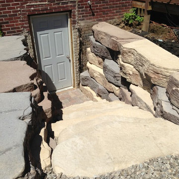 Outdoor living space with walkout basement addition