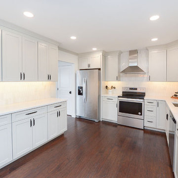 White Kitchen with Picket Backsplash