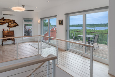 Example of a trendy home design design in Portland Maine