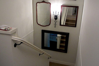 Stairwell painting of trim and walls