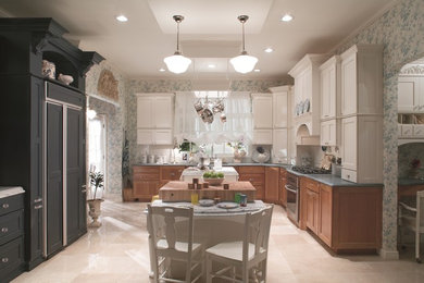 Example of a mid-sized transitional u-shaped ceramic tile eat-in kitchen design in Chicago with an undermount sink, shaker cabinets, white cabinets, wood countertops, white backsplash, stainless steel appliances and an island