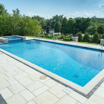 Burr Ridge Lap Pool with Raised Hot Tub and Waterfall