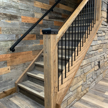 Custom railing designed with barnwood & wrought iron