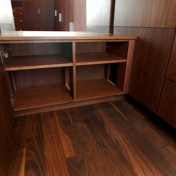 Hidden feline passageway in a luxury his-and-hers master closet