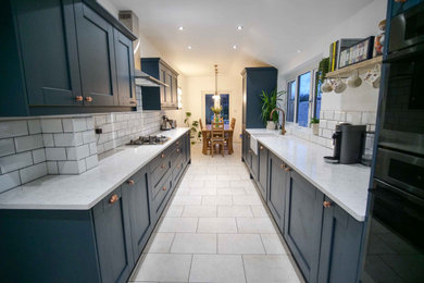This is an example of a contemporary kitchen in West Midlands.