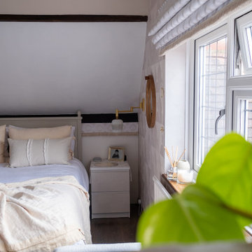 Oft, pale and feminine master bedroom, Essex