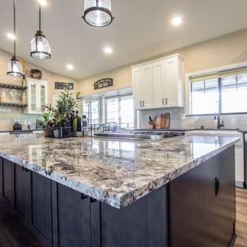 Spacious kitchen remodel using warm taupe, white and brown tones