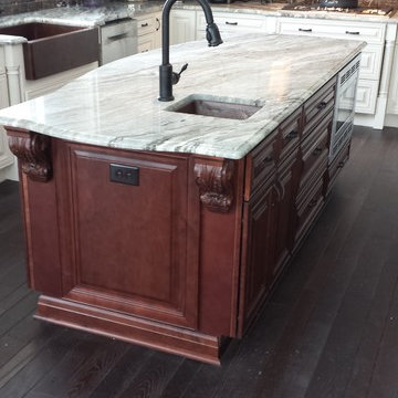 Antique White Kitchen with Mahogany Island.