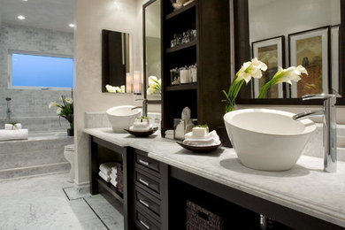 Inspiration for a transitional white tile marble floor bathroom remodel in Orange County with a vessel sink, marble countertops, an undermount tub and white walls