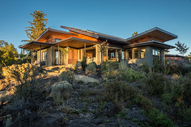 Mountain style home design photo in Portland