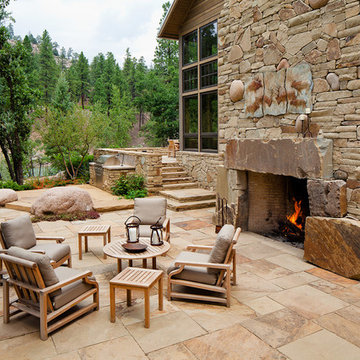 Custom stone patio and fireplace