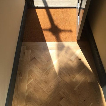Installing Herringbone Wood Floor to Premises