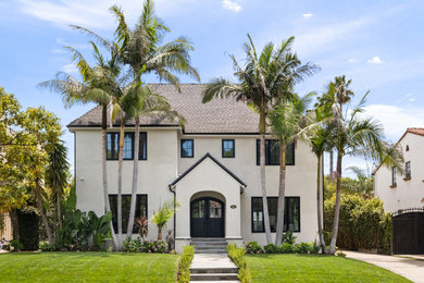 Huge traditional two-story exterior home idea in Los Angeles