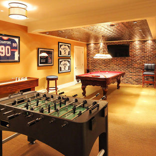 Inspiration for a large traditional fully buried basement in New York with yellow walls, carpet and beige floors.