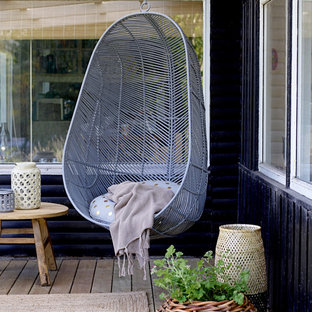 ロンドンのインダストリアルスタイルのおしゃれなデッキ (日よけなし) の写真