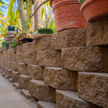 Elegant Outdoor Transformation with Retaining Wall & Paver Design