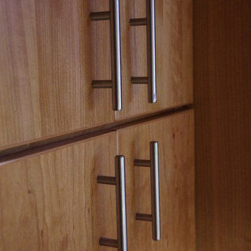 Kitchen with Flat Panel Cherry Cabinets