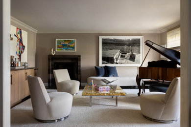 Living room - mid-sized contemporary enclosed medium tone wood floor living room idea in New York with a music area, white walls, no fireplace and no tv