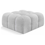Meridian Furniture - Ames Boucle Fabric Modular Chair, Gray, Ottoman - Introduce a touch of modern sophistication to your living area with the exquisite Ames Boucle Fabric Ottoman. With plush grey boucle fabric and unique design, it will elevate the visual appeal of your living space. This elegant and captivating ottoman can be mixed and matched with other pieces from the collection to create an endless array of stunning looks. So, get ready to transform your living area into an inviting and stylish haven with the Ames Boucle Fabric Ottoman.