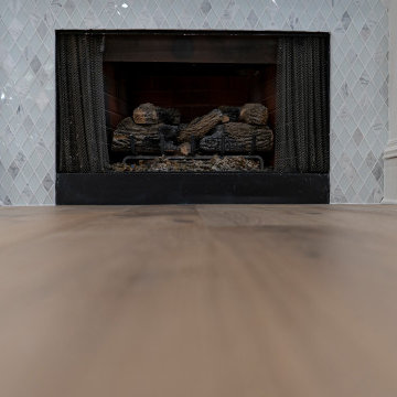 Wood Flooring & Marble Fireplace by Winston Interiors