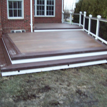 TREX TRANSCENDS SPICED RUM WITH VINTAGE LANTERN BORDER & WHITE TREX RAILING