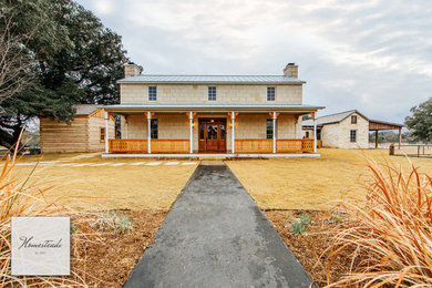 Design ideas for a farmhouse house exterior in Austin.