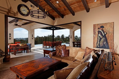 Example of a tuscan living room design in San Diego