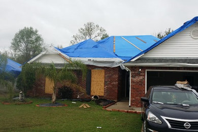 Example of a minimalist exterior home design in New Orleans