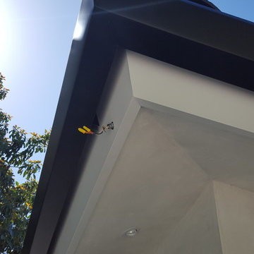 Huntington Beach California, White Fascia Wrap, Black 6 inch Angle Face Gutters