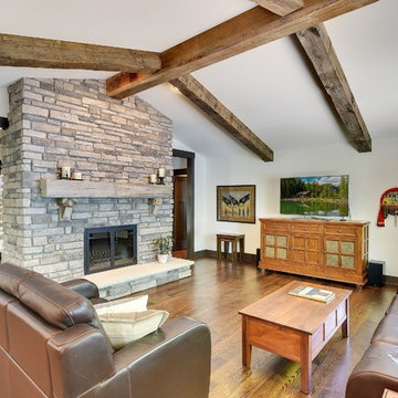 Weathered Antique Box Beams on a Vaulted Ceiling with a Stone Fireplace