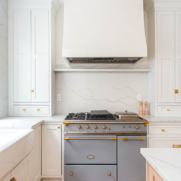 Château Charm: French-Inspired Kitchen Renovation with Plaster Hood Blue Stove a