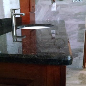 Antigo Bath Remodel - India Copper Brown Granite & Gray Porcelain Tile
