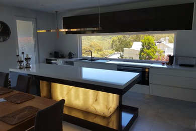 Photo of a modern home design in Adelaide.