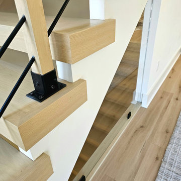 Project #111 | Open-Riser Staircase with Glass Panel Detail