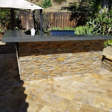 back yard outdoor, firepit, bbq, free standing walls and pavers
