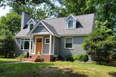 Mid-sized transitional gray two-story mixed siding exterior home photo in Richmond with a shingle roof