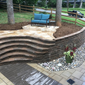 Multi-Level Paver Patio with Staircase and Seating