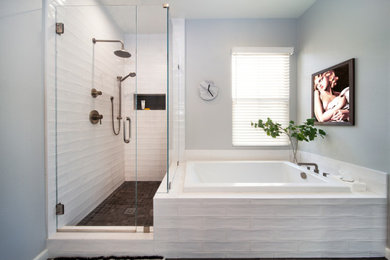 Bathroom - mid-sized modern master white tile and porcelain tile porcelain tile, black floor and double-sink bathroom idea in Orange County with shaker cabinets, white cabinets, a one-piece toilet, gray walls, an undermount sink, quartz countertops, a hinged shower door, beige countertops, a niche and a built-in vanity