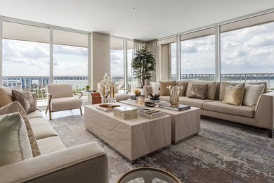 Inspiration for a large contemporary formal and open concept porcelain tile and beige floor living room remodel in Miami with beige walls, no fireplace and no tv
