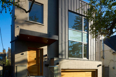 Example of a trendy exterior home design in Toronto