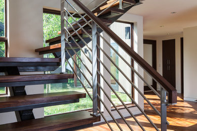Staircase - contemporary staircase idea in Other