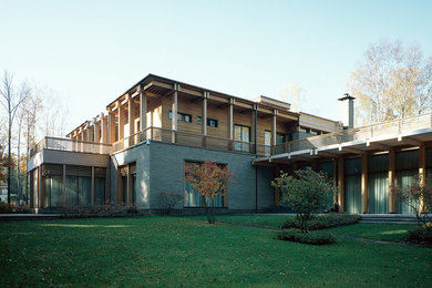 Example of a large minimalist multicolored two-story mixed siding exterior home design in San Francisco
