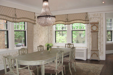 Enclosed dining room - large scandinavian dark wood floor enclosed dining room idea in Chicago with beige walls and no fireplace