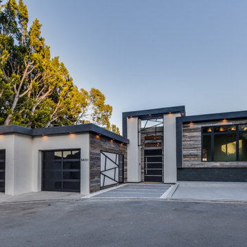 Reclaimed Wood Street Elevation with Steel Entry Gate