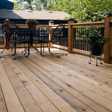 Stoerman - Cedar deck in Overland Park, Ks. Stamped concrete patio & deck light