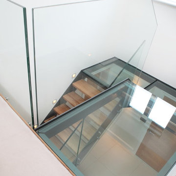 Contemporary floating glass staircase