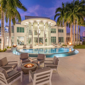 Freeform Infinity Edge Pool with Lap Pool/Spa with Fire Bowls in Ft. Lauderdale